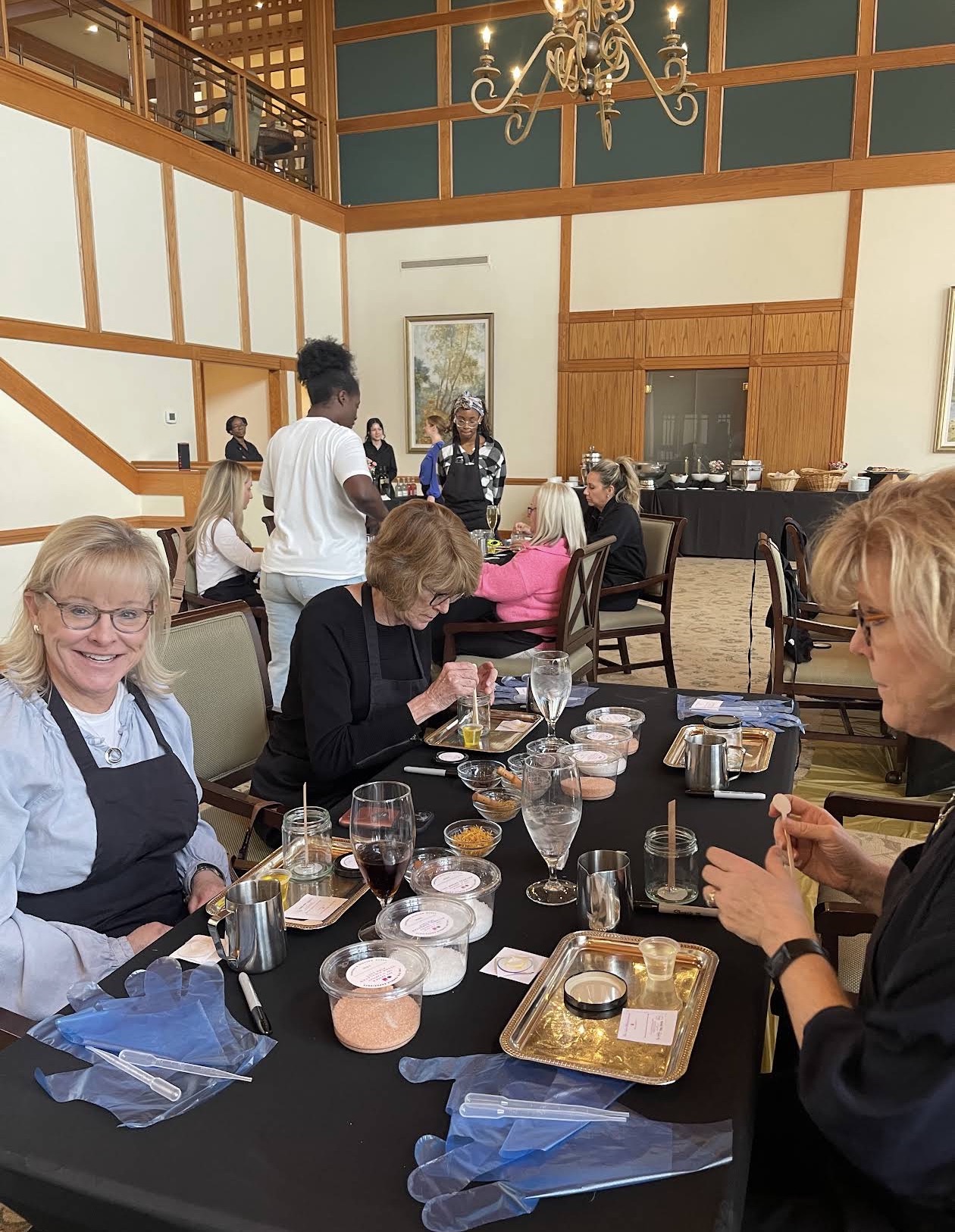 Guests enjoying a candle and perfume making experience