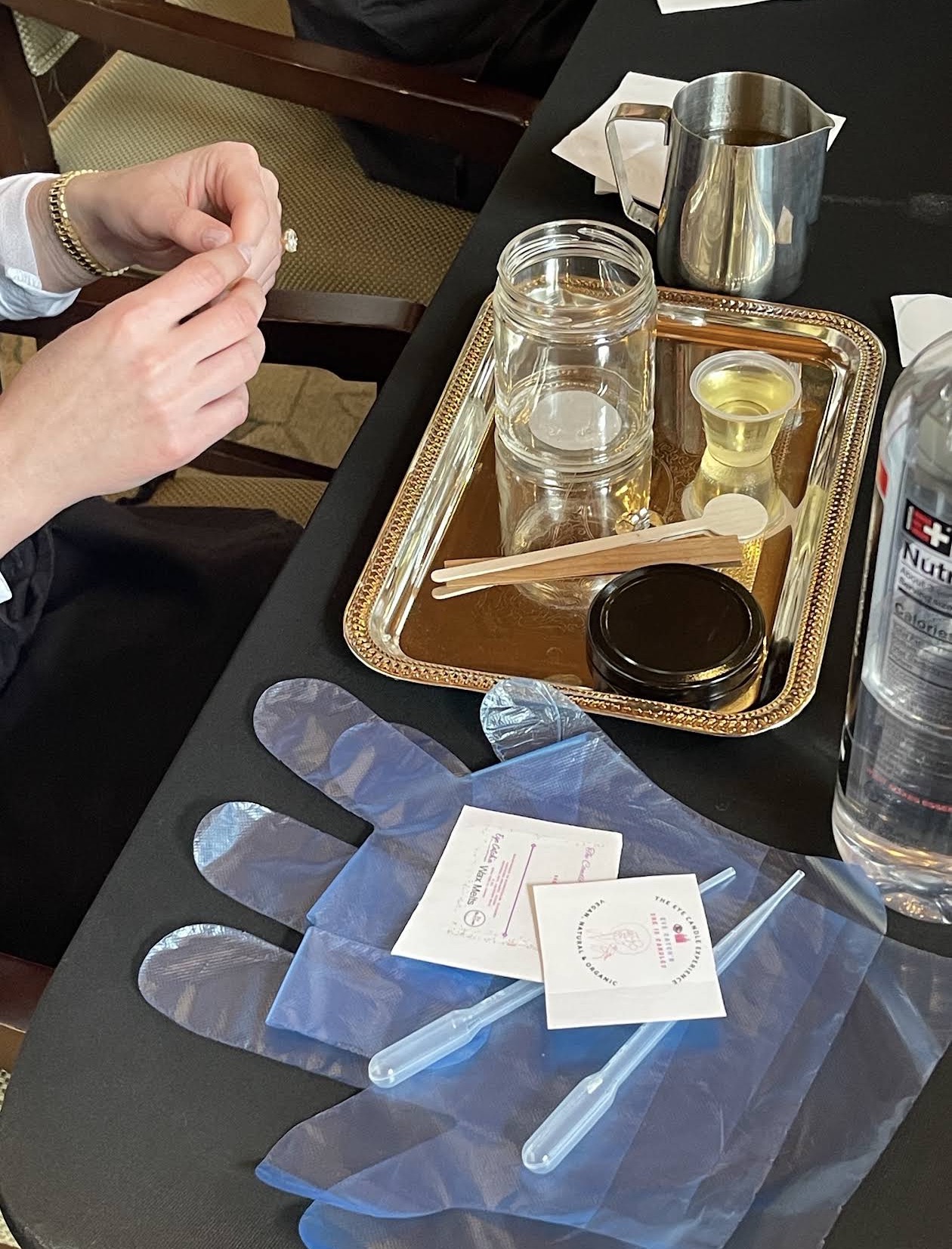 Vegan candle-making materials prepared for baby shower guests