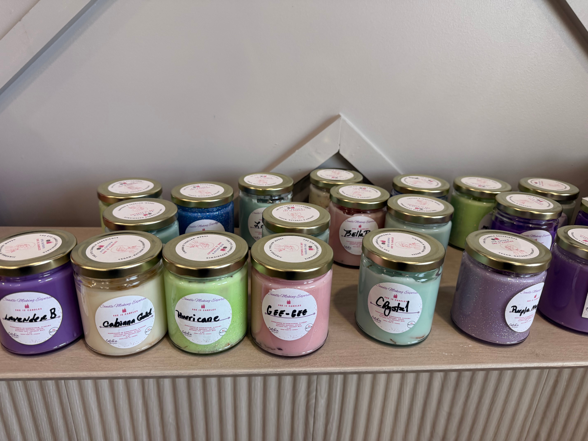 Hand-poured candles created during a birthday experience