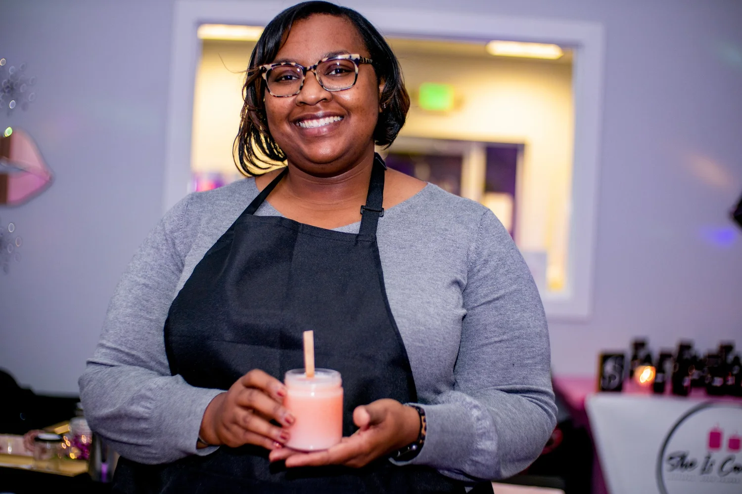 Niambi holding a finished candle